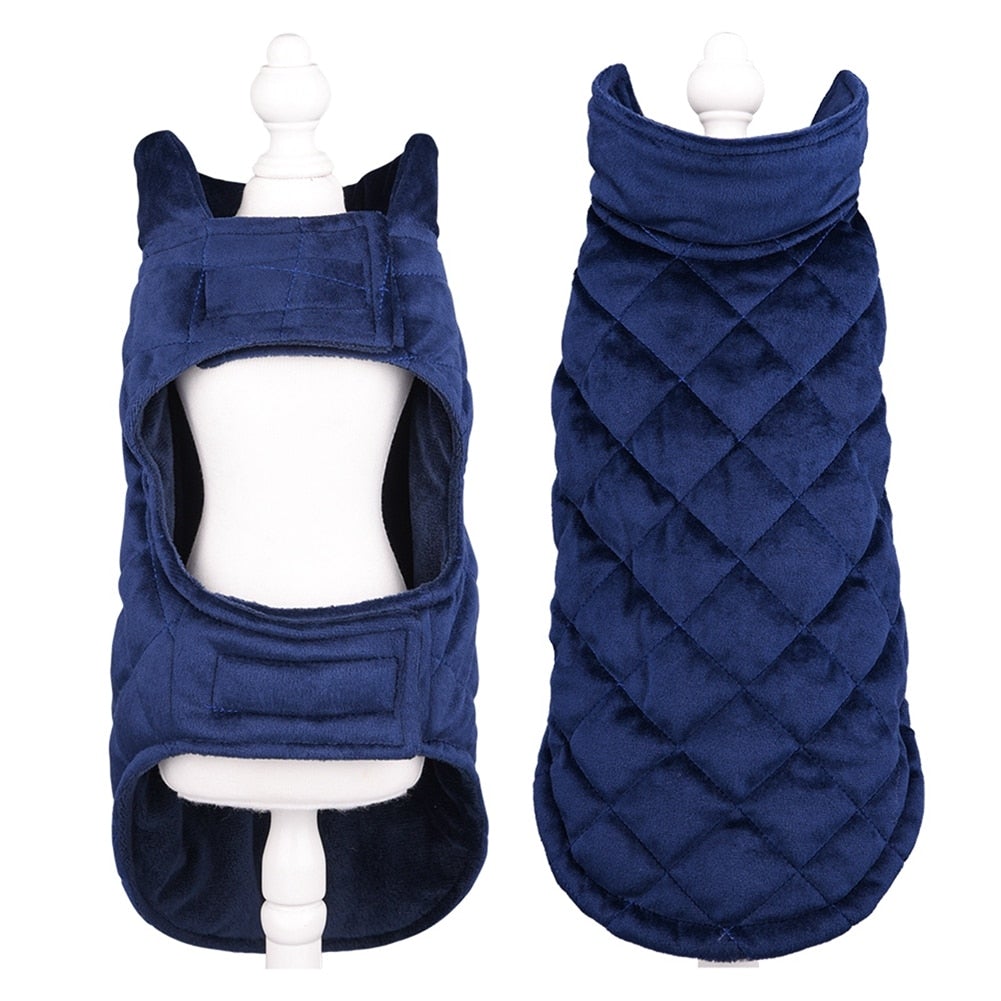 Dogs Winter Warm Vest azul escuro em material acolchoado, ideal para proteger cães no inverno com conforto e estilo, oferecendo bem-estar natural e vitalidade.