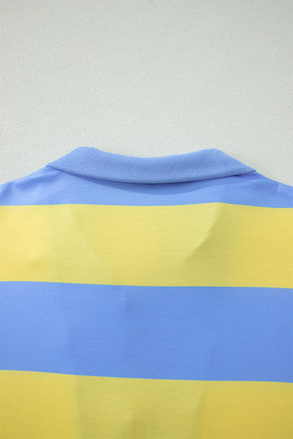 Imagem da parte traseira de uma peça de vestuário em tons azul e amarelo, destacando detalhes da gola, relacionada ao Pink Seam Detail Half Zip Tee Casual Shorts 2pcs Set, ideal para complementar o estilo casual com conforto, promovendo bem-estar natural e energia.