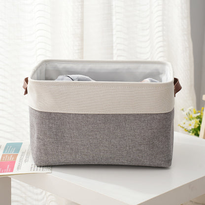 Cesto de armazenamento portátil e dobrável em tecido cinza e branco, ideal para organizar roupas, livros, snacks, brinquedos e cosméticos. Thickened foldable portable clothing storage basket books snacks toys cosmetics storage box. suplementos premium naturais para energia, vitalidade  e saúde cognitiva, desenvolvidos para o mercado português.