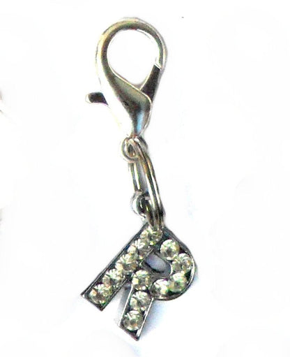 Pingente de letra R com cristais brilhantes, parte dos A-Z Crystal Letter Pet Charms, ideal para personalizar acessórios com estilo e elegância, associados a suplementos premium naturais para energia, vitalidade e saúde cognitiva.