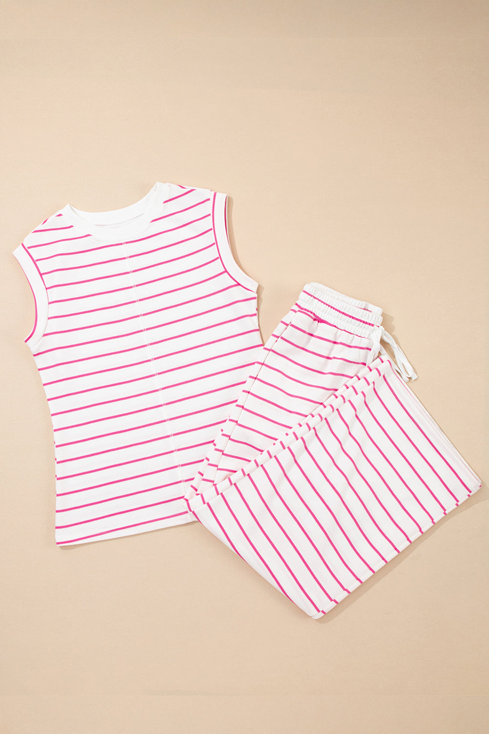 Conjunto Sail Blue Casual Striped Tee and Wide Leg Pants Set em tecido leve branco com riscas finas cor de rosa, alia conforto e estilo casual perfeito para o dia a dia, suplementos premium naturais para energia, vitalidade e saúde cognitiva, desenvolvidos para o mercado português.