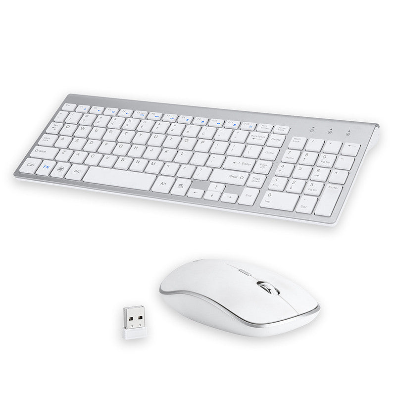 Teclado e mouse sem fio para escritório em uso com notebook ao fundo